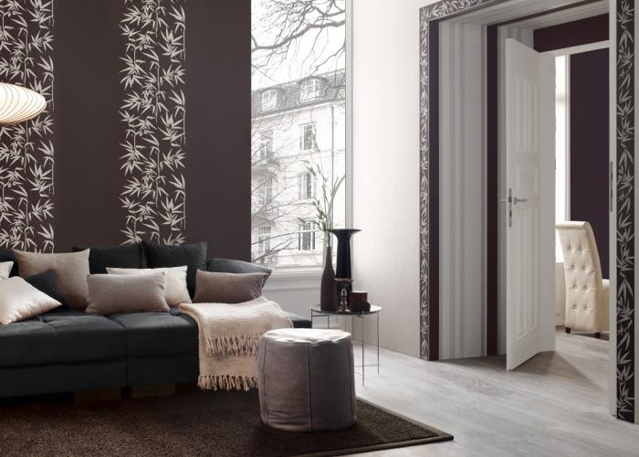 Дизайн современной уютной гостиной в коричневом цвете. Обои фирмы Jette. Ламинат Alloc